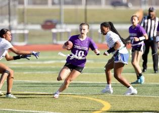 Elaina Wood breaks through the Gladiators defense in the first half.