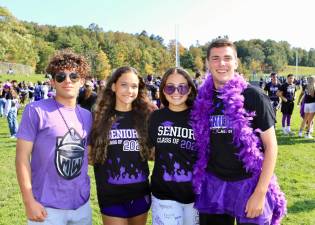 Seniors Ryan Guzman, Diane Lange, Courtney Key and Ethan Meyers show their school spirt at the Senior picnic.