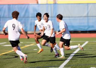 Luka Tatanashvili celebrates his game-winning goal in the second half.