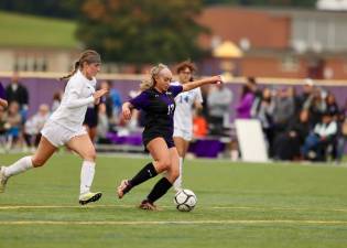 Madison Magazino takes a shot in the first half.