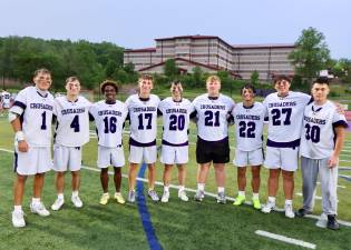 The seniors on this year’s team were honored in a brief ceremony after the game. (L-R) Gavin Fitzgibbon, Michael Luongo, Tyler Tenemille, Liam Williamson, Joey Buchanan, Ashton Capen, Anthony Severo, Jose Hernandez and Chadwick Kistler.