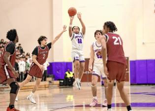 JamirJohnson, #12, scored nine points in the game.