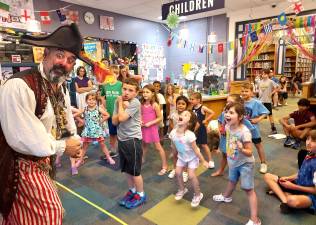 Children enjoying a pirate-themed program at the Monroe Free Library.