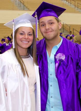 Seniors Nicole Scancarello and Brendan Doheny are all smiles as the seniors gather in the gym before the Graduation Ceremony begins.