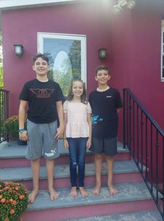 Jack 8th grade, Iris 4th grade, and Liam, 7th grade. Their mom, an elementary school teacher, took leave for the year to homeschool them.