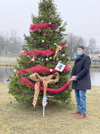 Village of Monroe Mayor Neil Dwyer chose the winning tree, designed and decorated by Troop 81.