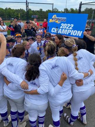 The undefeated Monroe-Woodbury softball team celebrates their big win.