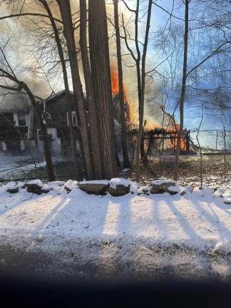 Woodbury firefighters extinguish raging blaze at Highland Mills home