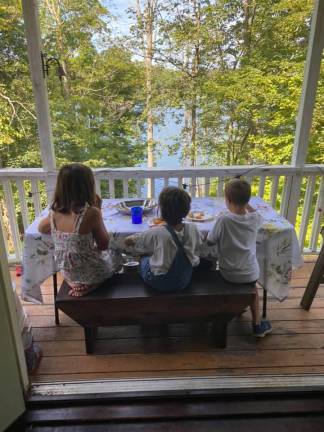 Sara, 7th grader at MWMS, with Hannah, 4th grade and Liam, 2nd grade at Pine Tree. “My three kids have never had lunch together on a school day, until now,” their mom, Annie said.