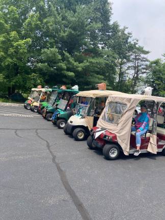 Residents drive golf carts at Knoll Heights in Sparta, N.J.