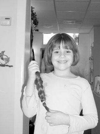 Locks of Love gets another 11 inches