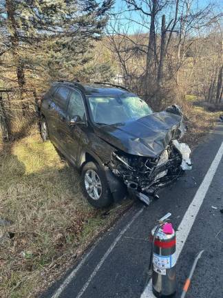 Dump truck ignites after crash with SUV