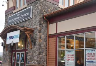 The former welcome center at Woodbury Common in Central Valley has been converted into an urgent care that’s bustling with people in need of COVID tests. Photo by Becca Tucker.