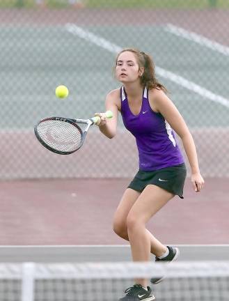 McKenzie Finnen moves to net in her doubles match.