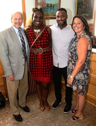 Village of Monroe Mayor Neil Dwyer, the Rev. Wendy Paige, Douglas Paige and Village of Monroe Trustee Dorey Houle.