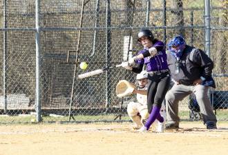 Gabby Schaeffer (#1) belts a two-run homerun to left in the sixth inning of the Crusaders’ game against the Warwick Wildcats. Photos by William Dimmit.