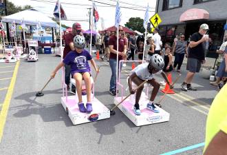 More than 100 participants competed in Nebrasky’s Toilet Bowl Races at the Monroe Cheese Festival.