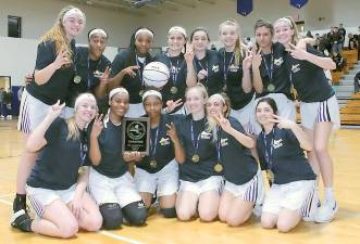 The 2019-2020 Section 9 AA Champion Crusaders celebrate after defeating the Valley Central Vikings for the title.