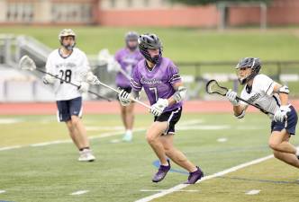 #7, Max Weeks got the Crusaders started when he scored the first goal.