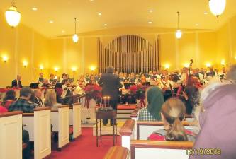 On Dec. 15, the First Presbyterian Church of Monroe hosted the presentation of Johann Sebastian Bach’s Cantata “Magnificat” with a 21-piece orchestra and combined choirs from Bellvale Bruderhof Community, Hudson Opera Theatre and Chancel Choir of The First Presbyterian Church. All religious faiths were in the audience enjoying the work put together by Ron De Fesi, the churches musical director.