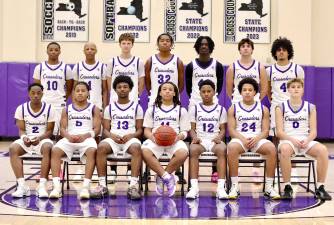 The 2025-2026 Crusader Varsity Basketball Team - seated (from left): Zahir Knight, Jeremy Jimenez, Daniel Omitiran, Jamir Johnson, Marcus Jerome, Christian Pierre and Garrett Rostkowski. Standing (from left): Vodjley Jovial, Kristopher Bjaelker, Luke Postolowski, Dozie Nwigwe, Fabrice Ndja, Charlie Theokas and Alex Diaz.