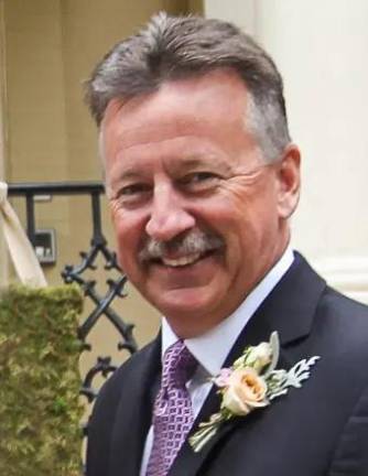 Michael E. Welsh.