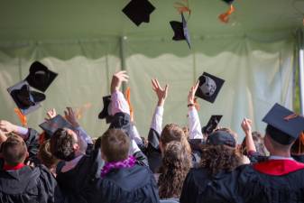 College. Local students receive degrees