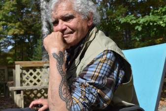 Musician Marty Kupersmith, 83, got a rattlesnake tattoo to commemorate his bite.