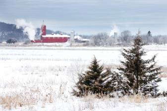 Steam rises from The Black Dirt Distillery in Pine Island, NY, as whiskey is processed on a frigid winter morning, Tuesday, January 9, 2024.