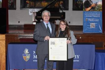 Assemblymember Christopher Eachus with Raquel Rios-Ortiz during the March 23 Extraordinary Women of the 99th Assembly District” event.