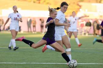 Kyra Gilligan scores late in the second half to seal the Crusader victory.