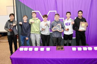 The Crusader boys Class A NYSPHSAA cross country champions receive their rings. L-R: Krzysztof Balbuena Matusiak, Tim Belmont, Gavin Catherwood, Vinny Costello, Shane Golio, Dylan Haag, and Ronaldo Rodriguez Perez. Not pictured: Devon Ryan.
