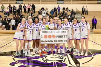 Madison Fileen became the first female Crusader to score 1,000 points in her varsity basketball career.