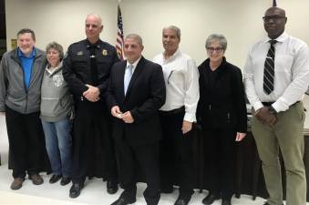Pictured from left to right are Village of Harriman Trustees Bruce Chichester and Sandy Daly, retiring Police Chief Dan Henderson, new Police Chief Patrick Tenaglia, Mayor Lou Medina, Deputy Mayor Carol Schneider and Trustee Wayne Mitchell. Photo by Jim Kelly provided by the Village of Harriman.