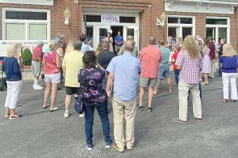 Chele Farley, Republican and Conservative candidate in New York’s 18th Congressional district, speaks with well-wishers at the opening of her campaign office at 25 Main St. in Goshen. (Provided photos).