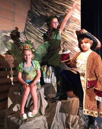 Tinkerbell (Abigail Yurchuk), Peter Pan (Charlie Curabba),and Capt. Hook (Lucas Cresser).