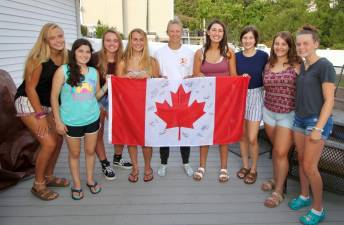 Crusaders teammates welcome home Samantha Ryan.