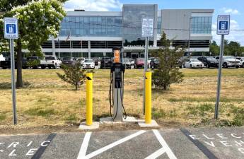 The new electric vehicle charging station at the Government Center is one of three that have been installed in Orange County.