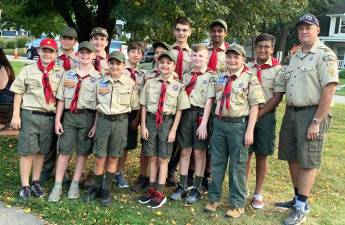 Boy Scout Troop 440 participated in the 9/11 Remembrance Day in Monroe. Pictured from left to right, beginning in the back row, are: Noah Sequeiros, Michael Kearney, Nicholas Doran, Sebastian Sequeiro, David Pomerantz, Shravan Ranganathan and Nicolas Alappat. And in front: Daniel Ruggerio, Patrick Martinez, Matthew Capps, Dylan McCann, Tyler Wood, Jack Thau and Troop Committee Chairman Steven Thau.
