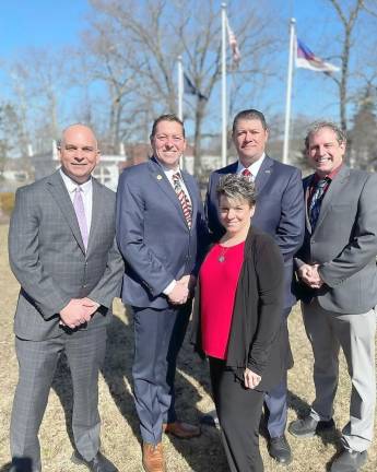 Pictured from left to right are Monroe Town Republican candidates Sal Scancarello, James “Pat” Patterson, Steve Thau, James McKnight, and center, Valerie Bitzer. Photo provided by Laura Fernandez/Town of Monroe Republican Committee.