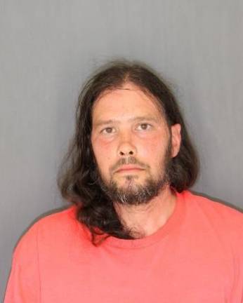 New Hampton resident Brian Scott was charged with conspiracy in the second degree.