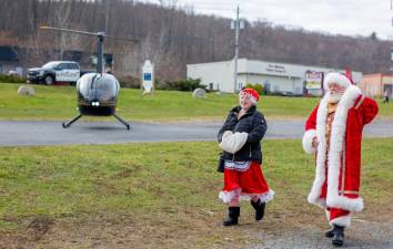 Santa and Mrs. Claus arrival at Museum Village in Monroe last Saturday. Photos by Sammie Finch.