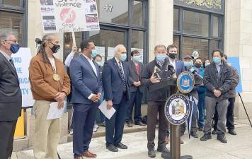 “In this past year of global pandemic,” state Sen. John Liu of Queens said during a rally outside of the office of state Sen. James Skoufis in Newburgh, “the Asian American community has faced a secondary virus, that of hate and bigotry.” Provided photos.