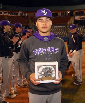 Photos by William Dimmit Shortstop Jack Bermingham's six hits and strong play in the field helped him get All Tournament Team Honors.