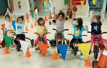 St. Paul Christian Education Center students (l-r) Kayleigh Grosso, Vivienee Rcheulishvili, Scarlett Ferris, Amalia Taveras, Noah Toledo and Madison Columbus celebrate victory.