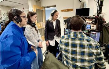 Mount Saint Mary College students and Digital Media Production instructor Merle Becker help at a taping of the Netflix show “Four Seasons” in the school’s Nursing Department.