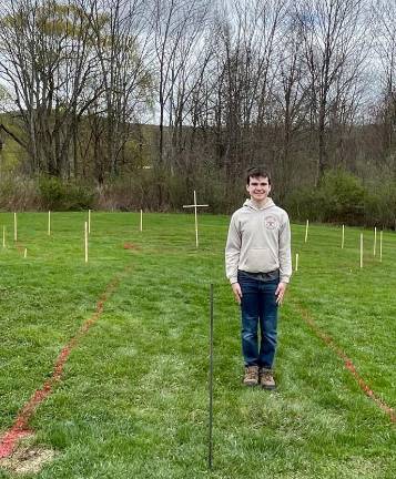 Before: Back in April, Troop 440 Eagle Scout candidate Michael Kearney mapped out the 2,125-square-foot prayer garden in the rear of the parking lot of St. Patrick’s Church that he and volunteers could complete in September. Photos provided by the Kearney family.