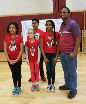 Team Programming Penguins: Kashaf Jafry, Shees Jafry, Olivia Cooper and Aishwarya Rajendran with Coach Rajendran Balaraman.