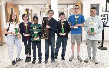 Pictured, from left to right, are members of the championship Black Team are: Celeste O'Grady, Annika Tomaras, Prasad Saha, James Nicoll, William Nicoll, Ariel Koyfman and Jack Kehnle.