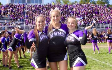 Cheerleader Captains, from left to right: Emily Campbell, Georgia Brink and Hannah Whitfield.